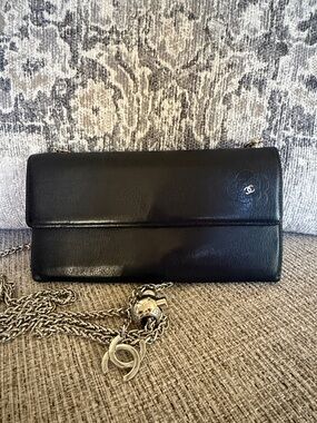 CHANEL Black Leather Flap Wallet with Silver Chain and CC Charm
